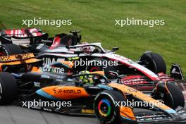 Lando Norris (GBR) McLaren MCL60 and Kevin Magnussen (DEN) Haas VF-23 battle for position. 18.06.2023. Formula 1 World Championship, Rd 9, Canadian Grand Prix, Montreal, Canada, Race Day.