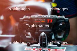 Sergio Perez (MEX) Red Bull Racing RB19 - steering wheel. 17.06.2023. Formula 1 World Championship, Rd 9, Canadian Grand Prix, Montreal, Canada, Qualifying Day.