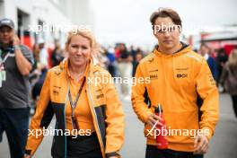 (L to R): Sophie Ogg (GBR) McLaren Communications Director with Oscar Piastri (AUS) McLaren. 18.06.2023. Formula 1 World Championship, Rd 9, Canadian Grand Prix, Montreal, Canada, Race Day.
