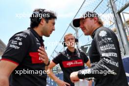 (L to R): Alexander Chan, Alfa Romeo F1 Team Race Engineer; Antti Vierula (FIN) Personal Trainer; and Valtteri Bottas (FIN) Alfa Romeo F1 Team, on the grid. 04.06.2023. Formula 1 World Championship, Rd 8, Spanish Grand Prix, Barcelona, Spain, Race Day.