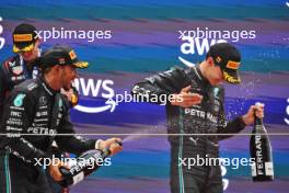 (L to R): Lewis Hamilton (GBR) Mercedes AMG F1 celebrates his second position on the podium with third placed team mate George Russell (GBR) Mercedes AMG F1. 04.06.2023. Formula 1 World Championship, Rd 8, Spanish Grand Prix, Barcelona, Spain, Race Day.