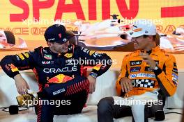 (L to R): Max Verstappen (NLD) Red Bull Racing and Carlos Sainz Jr (ESP) Ferrari in the post qualifying FIA Press Conference. 03.06.2023. Formula 1 World Championship, Rd 8, Spanish Grand Prix, Barcelona, Spain, Qualifying Day.