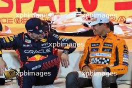 (L to R): Max Verstappen (NLD) Red Bull Racing and Carlos Sainz Jr (ESP) Ferrari in the post qualifying FIA Press Conference. 03.06.2023. Formula 1 World Championship, Rd 8, Spanish Grand Prix, Barcelona, Spain, Qualifying Day.