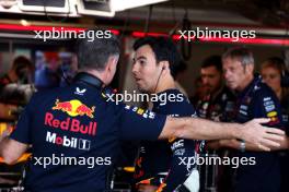 (L to R): Christian Horner (GBR) Red Bull Racing Team Principal with Sergio Perez (MEX) Red Bull Racing. 07.07.2023. Formula 1 World Championship, Rd 11, British Grand Prix, Silverstone, England, Practice Day.