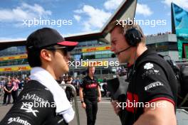 Zhou Guanyu (CHN) Alfa Romeo F1 Team on the grid. 09.07.2023. Formula 1 World Championship, Rd 11, British Grand Prix, Silverstone, England, Race Day.