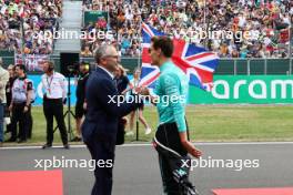 (L to R): Stefano Domenicali (ITA) Formula One President and CEO with George Russell (GBR) Mercedes AMG F1 on the grid. 09.07.2023. Formula 1 World Championship, Rd 11, British Grand Prix, Silverstone, England, Race Day.