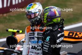 (L to R): Lando Norris (GBR) McLaren celebrates his second position in parc ferme with third placed Lewis Hamilton (GBR) Mercedes AMG F1. 09.07.2023. Formula 1 World Championship, Rd 11, British Grand Prix, Silverstone, England, Race Day.