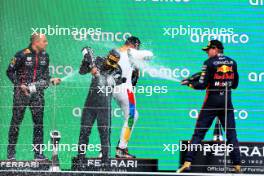 The podium (L to R): Gianpiero Lambiase (ITA) Red Bull Racing Engineer; Lewis Hamilton (GBR) Mercedes AMG F1, third; Lando Norris (GBR) McLaren, second; Max Verstappen (NLD) Red Bull Racing, race winner. 09.07.2023. Formula 1 World Championship, Rd 11, British Grand Prix, Silverstone, England, Race Day.