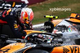Lando Norris (GBR) McLaren MCL60 celebrates his second position in parc ferme with race winner Max Verstappen (NLD) Red Bull Racing. 09.07.2023. Formula 1 World Championship, Rd 11, British Grand Prix, Silverstone, England, Race Day.