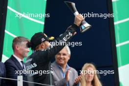 Lewis Hamilton (GBR) Mercedes AMG F1 celebrates his third position on the podium. 09.07.2023. Formula 1 World Championship, Rd 11, British Grand Prix, Silverstone, England, Race Day.