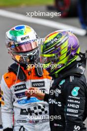 (L to R): Lando Norris (GBR) McLaren celebrates his second position with third placed Lewis Hamilton (GBR) Mercedes AMG F1. 09.07.2023. Formula 1 World Championship, Rd 11, British Grand Prix, Silverstone, England, Race Day.