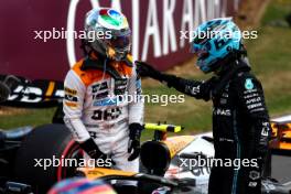 (L to R): Lando Norris (GBR) McLaren celebrates his second position in parc ferme with George Russell (GBR) Mercedes AMG F1. 09.07.2023. Formula 1 World Championship, Rd 11, British Grand Prix, Silverstone, England, Race Day.