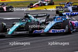 (L to R): Logan Sargeant (USA) Williams Racing FW45 and Pierre Gasly (FRA) Alpine F1 Team A523 battle for position. 09.07.2023. Formula 1 World Championship, Rd 11, British Grand Prix, Silverstone, England, Race Day.