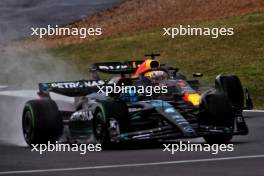 Max Verstappen (NLD) Red Bull Racing RB19 and George Russell (GBR) Mercedes AMG F1 W14. 08.07.2023. Formula 1 World Championship, Rd 11, British Grand Prix, Silverstone, England, Qualifying Day.