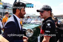 (L to R): Mohammed Bin Sulayem (UAE) FIA President with Valtteri Bottas (FIN) Alfa Romeo F1 Team on the drivers' parade. 09.07.2023. Formula 1 World Championship, Rd 11, British Grand Prix, Silverstone, England, Race Day.