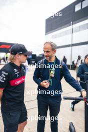 (L to R): Valtteri Bottas (FIN) Alfa Romeo F1 Team with Adam Norris (GBR). 06.07.2023. Formula 1 World Championship, Rd 11, British Grand Prix, Silverstone, England, Preparation Day.