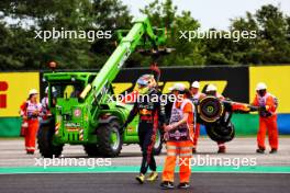 Sergio Perez (MEX) Red Bull Racing RB19 crashed in the first practice session. 21.07.2023. Formula 1 World Championship, Rd 12, Hungarian Grand Prix, Budapest, Hungary, Practice Day.