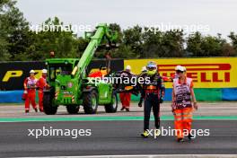 Sergio Perez (MEX) Red Bull Racing RB19 crashed in the first practice session. 21.07.2023. Formula 1 World Championship, Rd 12, Hungarian Grand Prix, Budapest, Hungary, Practice Day.