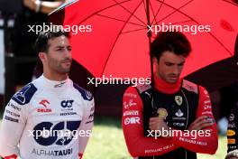 (L to R): Daniel Ricciardo (AUS) AlphaTauri and Carlos Sainz Jr (ESP) Ferrari on the grid. 23.07.2023. Formula 1 World Championship, Rd 12, Hungarian Grand Prix, Budapest, Hungary, Race Day.