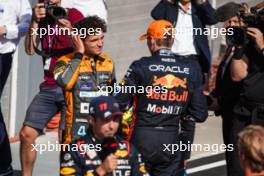 (L to R): Second placed Lando Norris (GBR) McLaren in parc ferme with race winner Max Verstappen (NLD) Red Bull Racing. 23.07.2023. Formula 1 World Championship, Rd 12, Hungarian Grand Prix, Budapest, Hungary, Race Day.