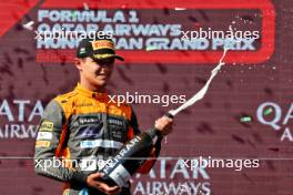 Lando Norris (GBR) McLaren celebrates his second position on the podium. 23.07.2023. Formula 1 World Championship, Rd 12, Hungarian Grand Prix, Budapest, Hungary, Race Day.