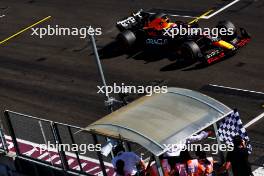 Race winner Max Verstappen (NLD) Red Bull Racing RB19 takes the chequered flag at the end of the race. 23.07.2023. Formula 1 World Championship, Rd 12, Hungarian Grand Prix, Budapest, Hungary, Race Day.