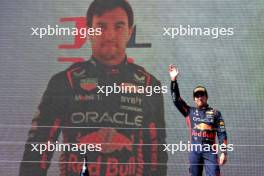 Sergio Perez (MEX) Red Bull Racing celebrates his third position on the podium. 23.07.2023. Formula 1 World Championship, Rd 12, Hungarian Grand Prix, Budapest, Hungary, Race Day.