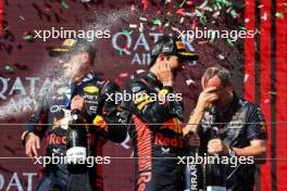 (L to R): Race winner Max Verstappen (NLD) Red Bull Racing celebrates on the podium with second placed team mate Sergio Perez (MEX) Red Bull Racing and Paul Monaghan (GBR) Red Bull Racing Chief Engineer. 23.07.2023. Formula 1 World Championship, Rd 12, Hungarian Grand Prix, Budapest, Hungary, Race Day.