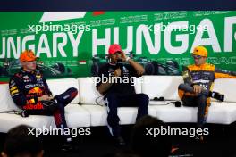(L to R): Max Verstappen (NLD) Red Bull Racing; Lewis Hamilton (GBR) Mercedes AMG F1; and Lando Norris (GBR) McLaren, in the post qualifying FIA Press Conference. 22.07.2023. Formula 1 World Championship, Rd 12, Hungarian Grand Prix, Budapest, Hungary, Qualifying Day.