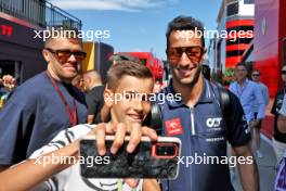 Daniel Ricciardo (AUS) AlphaTauri with fans. 22.07.2023. Formula 1 World Championship, Rd 12, Hungarian Grand Prix, Budapest, Hungary, Qualifying Day.