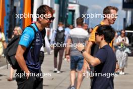 (L to R): Alexander Albon (THA) Williams Racing with Yuki Tsunoda (JPN) AlphaTauri. 22.07.2023. Formula 1 World Championship, Rd 12, Hungarian Grand Prix, Budapest, Hungary, Qualifying Day.