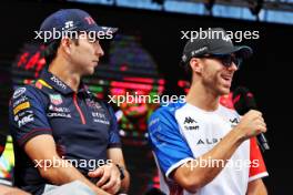 (L to R): Sergio Perez (MEX) Red Bull Racing and Pierre Gasly (FRA) Alpine F1 Team on the FanZone Stage. 22.07.2023. Formula 1 World Championship, Rd 12, Hungarian Grand Prix, Budapest, Hungary, Qualifying Day.