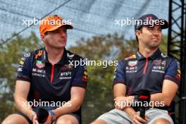 (L to R): Max Verstappen (NLD) Red Bull Racing and Sergio Perez (MEX) Red Bull Racing on the FanZone Stage. 22.07.2023. Formula 1 World Championship, Rd 12, Hungarian Grand Prix, Budapest, Hungary, Qualifying Day.