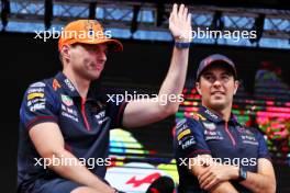 (L to R): Max Verstappen (NLD) Red Bull Racing and Sergio Perez (MEX) Red Bull Racing on the FanZone Stage. 22.07.2023. Formula 1 World Championship, Rd 12, Hungarian Grand Prix, Budapest, Hungary, Qualifying Day.
