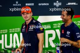 (L to R): Max Verstappen (NLD) Red Bull Racing and Daniel Ricciardo (AUS) AlphaTauri in the FIA Press Conference. 20.07.2023. Formula 1 World Championship, Rd 12, Hungarian Grand Prix, Budapest, Hungary, Preparation Day.