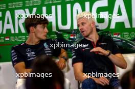 (L to R): George Russell (GBR) Mercedes AMG F1 and Nico Hulkenberg (GER) Haas F1 Team in the FIA Press Conference. 20.07.2023. Formula 1 World Championship, Rd 12, Hungarian Grand Prix, Budapest, Hungary, Preparation Day.