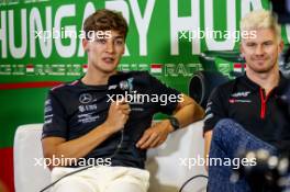 (L to R): George Russell (GBR) Mercedes AMG F1 and Nico Hulkenberg (GER) Haas F1 Team in the FIA Press Conference. 20.07.2023. Formula 1 World Championship, Rd 12, Hungarian Grand Prix, Budapest, Hungary, Preparation Day.