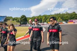 Zhou Guanyu (CHN) Alfa Romeo F1 Team walks the circuit with the team. 20.07.2023. Formula 1 World Championship, Rd 12, Hungarian Grand Prix, Budapest, Hungary, Preparation Day.