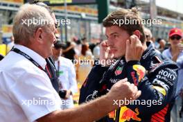 (L to R): Dr Helmut Marko (AUT) Red Bull Motorsport Consultant with Max Verstappen (NLD) Red Bull Racing on the grid. 03.09.2023. Formula 1 World Championship, Rd 15, Italian Grand Prix, Monza, Italy, Race Day.