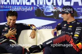 (L to R): Sergio Perez (MEX) Red Bull Racing and Max Verstappen (NLD) Red Bull Racing, in the post race FIA Press Conference. 03.09.2023. Formula 1 World Championship, Rd 15, Italian Grand Prix, Monza, Italy, Race Day.