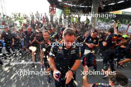 Christian Horner (GBR) Red Bull Racing Team Principal and the team celebrate a 1-2 finish and 10 wins in a row for Max Verstappen (NLD) Red Bull Racing. 03.09.2023. Formula 1 World Championship, Rd 15, Italian Grand Prix, Monza, Italy, Race Day.