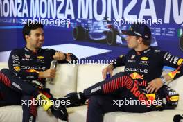 (L to R): Sergio Perez (MEX) Red Bull Racing and Max Verstappen (NLD) Red Bull Racing, in the post race FIA Press Conference. 03.09.2023. Formula 1 World Championship, Rd 15, Italian Grand Prix, Monza, Italy, Race Day.