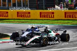 Valtteri Bottas (FIN) Alfa Romeo F1 Team C43 and Logan Sargeant (USA) Williams Racing FW45 battle for position. 03.09.2023. Formula 1 World Championship, Rd 15, Italian Grand Prix, Monza, Italy, Race Day.