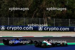 Valtteri Bottas (FIN) Alfa Romeo F1 Team C43 and Logan Sargeant (USA) Williams Racing FW45 battle for position. 03.09.2023. Formula 1 World Championship, Rd 15, Italian Grand Prix, Monza, Italy, Race Day.