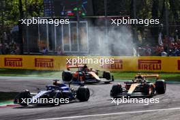 Alexander Albon (THA) Williams Racing FW45 and Lando Norris (GBR) McLaren MCL60 battle for position. 03.09.2023. Formula 1 World Championship, Rd 15, Italian Grand Prix, Monza, Italy, Race Day.