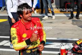 Carlos Sainz Jr (ESP) Ferrari celebrates his pole position in qualifying parc ferme. 02.09.2023. Formula 1 World Championship, Rd 15, Italian Grand Prix, Monza, Italy, Qualifying Day.