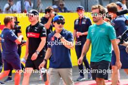 (L to R): Yuki Tsunoda (JPN) AlphaTauri and Fernando Alonso (ESP) Aston Martin F1 Team on the drivers' parade. 03.09.2023. Formula 1 World Championship, Rd 15, Italian Grand Prix, Monza, Italy, Race Day.