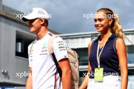 (L to R): Mick Schumacher (GER) Mercedes AMG F1 Reserve Driver with his girlfriend Laila Hasanovic (DEN). 22.09.2023. Formula 1 World Championship, Rd 17, Japanese Grand Prix, Suzuka, Japan, Practice Day.