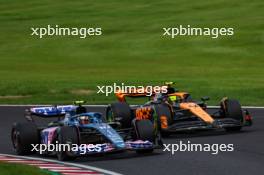 Pierre Gasly (FRA), Alpine F1 Team Lando Norris (GBR), McLaren F1 Team  22.09.2023. Formula 1 World Championship, Rd 17, Japanese Grand Prix, Suzuka, Japan, Practice Day.