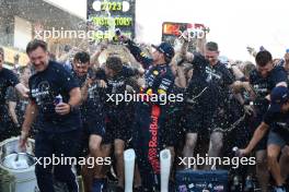 Max Verstappen (NLD) Red Bull Racing RB19 celebrates with the team  with Sergio Perez (MEX) Red Bull Racing RB19 and Christian Horner (GBR) Red Bull Racing Team Principal after winning the 2023 Constructors Championship. 24.09.2023. Formula 1 World Championship, Rd 17, Japanese Grand Prix, Suzuka, Japan, Race Day.